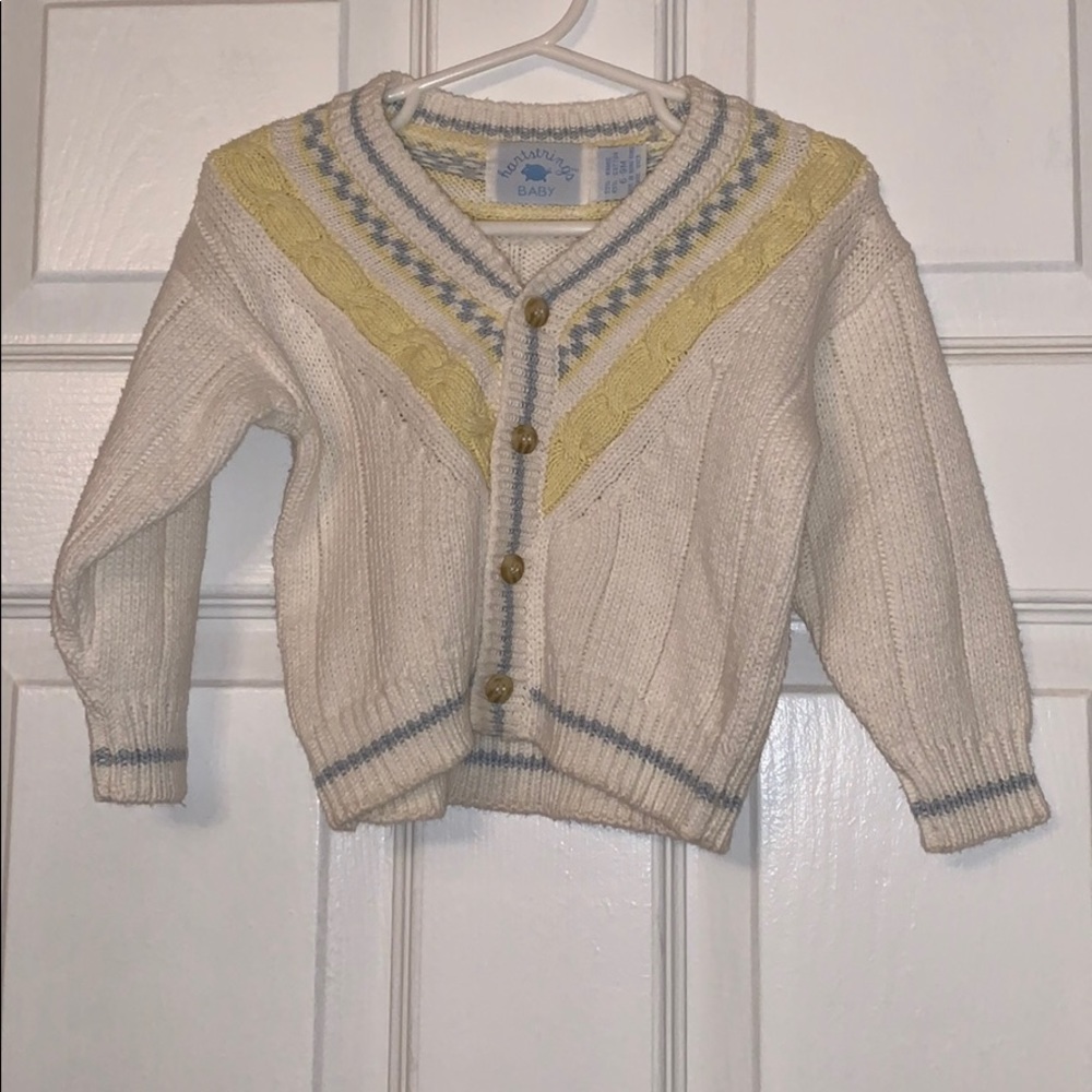 White Knit Baby Sweater with Yellow & Blue Details